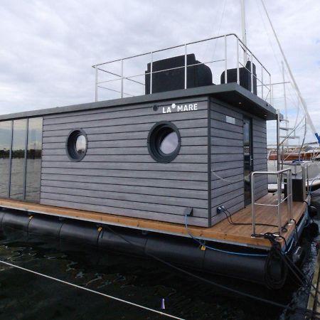 Hausboot Fjord Lacerta Mit Dachterrasse In Wendtorf Eksteriør bilde