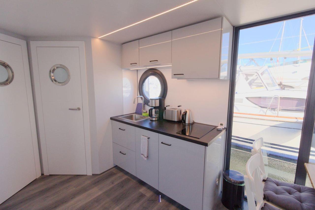 Hausboot Fjord Lacerta Mit Dachterrasse In Wendtorf Eksteriør bilde